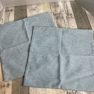 Nwot.  Set of 2 light blue, textured throw pillow cases. Same front & back 17x17
